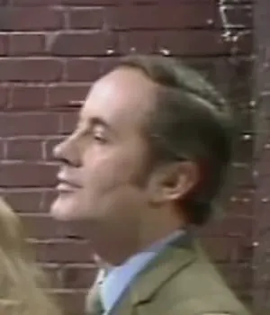 Man in brown jacket