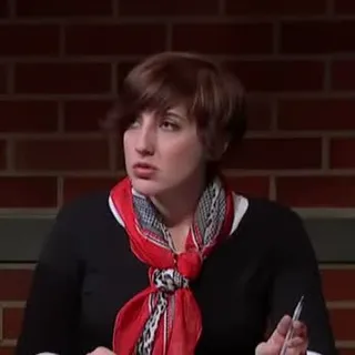 Judge with red scarf