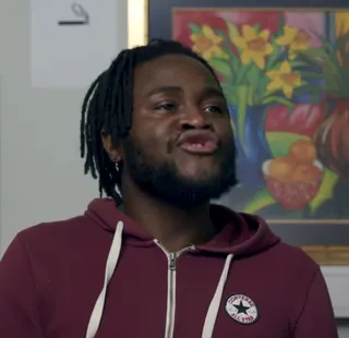 Student (burgundy hoodie)