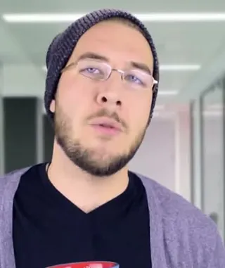 Coworker (beanie and glasses)