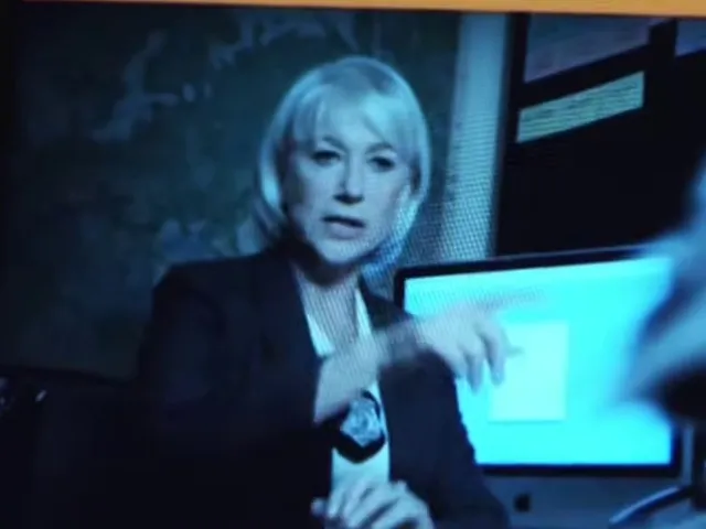 Helen Mirren as the police chief in the fictional film trailer inside SNL’s Rescue Dogs 3D. Official source https://www.youtube.com/watch?v=abtQCohsVt4 at 51.7 seconds; reviewed normally padded StarMapr portrait.