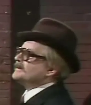 Man in black hat