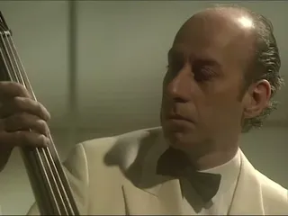 Simon Brint performing in Sophisticated Song (A Bit of Fry & Laurie, 1995). Reviewed scene-context crop from the official BBC upload.