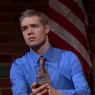 Judge in blue shirt